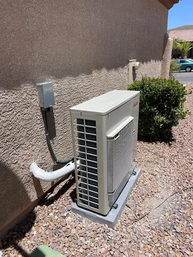 Residential air conditioning condenser unit in Emerson